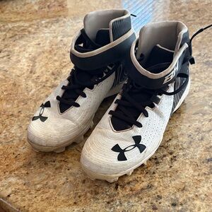 Under Armour Black and White High-Top Cleats